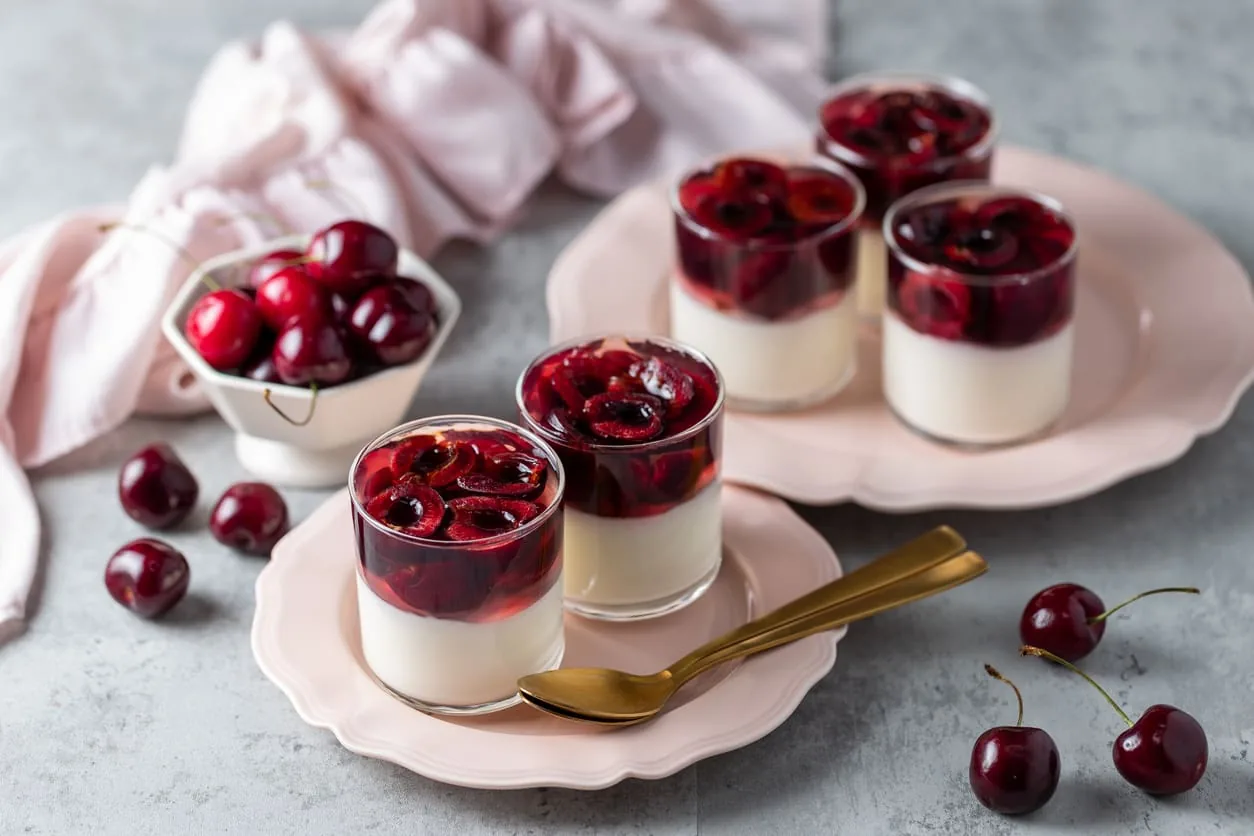 Cherry dessert cups with cream and berries